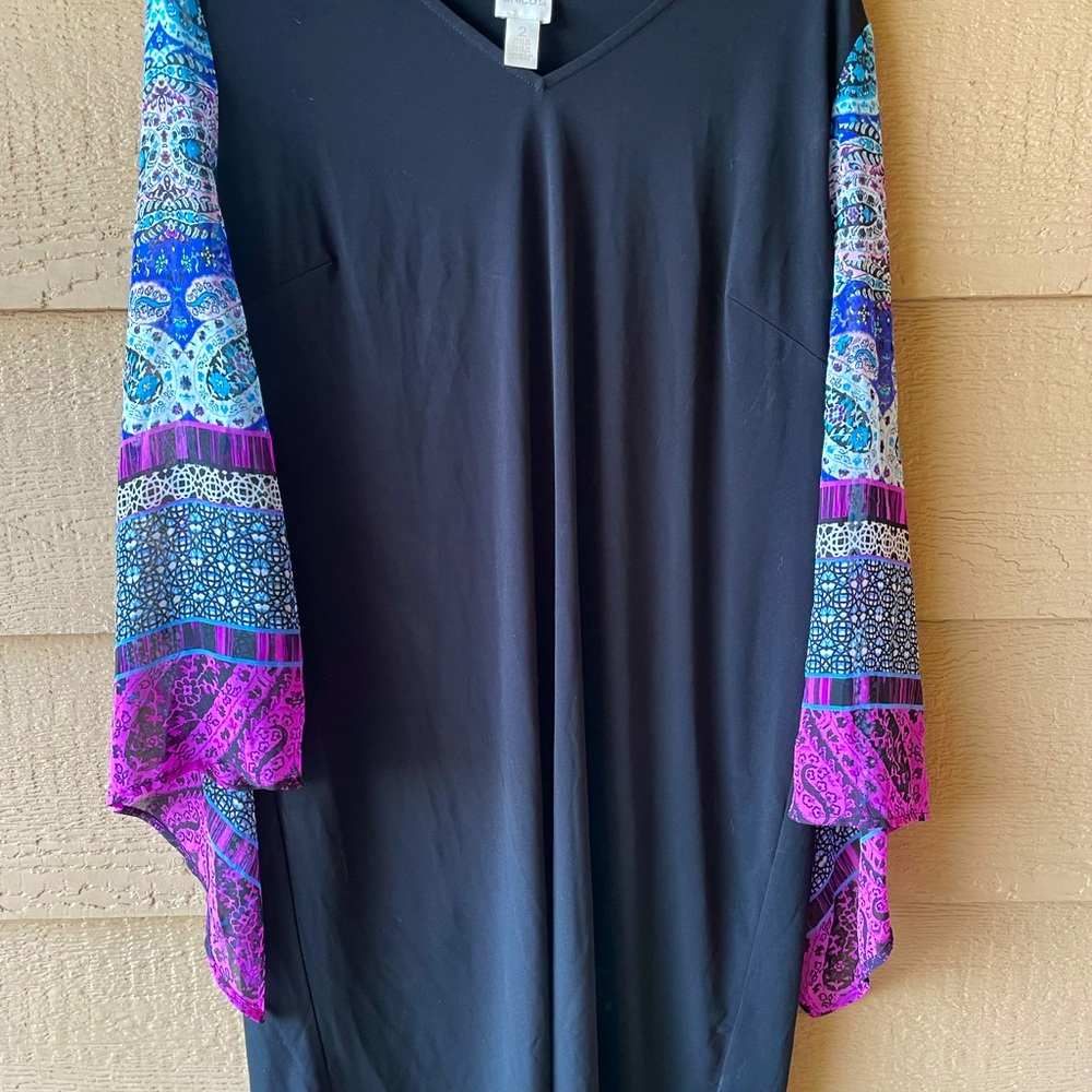 Black travelers dress with beautiful scarf sleeves